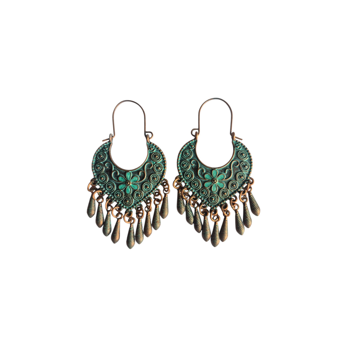 Pair of bronze-tone metal hoop earrings with green flowers, spiral detailing and dangling textured teardrop charms on white