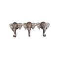 Antique nickel finish elephant-shaped hooks used as decorative hanging decor by Loren Boyd nz