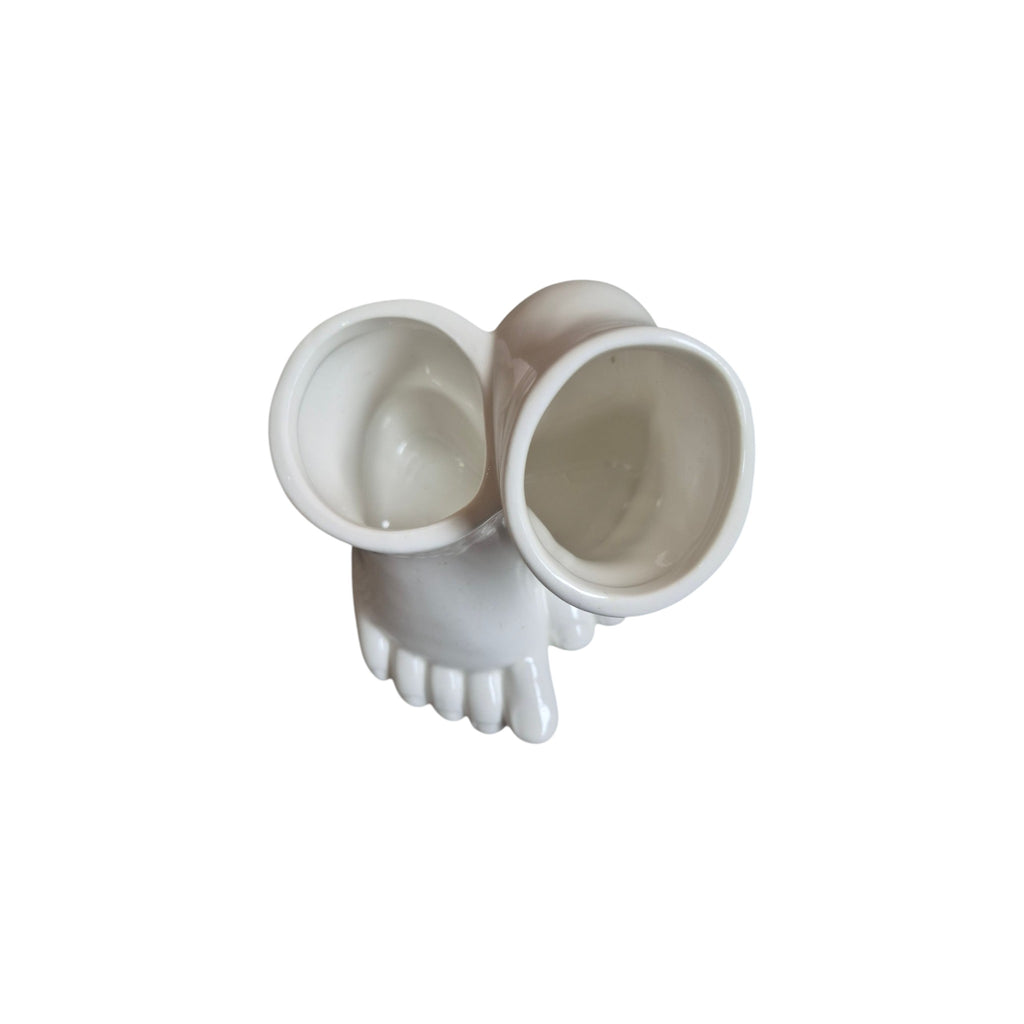 Loren Boyd baby feet planter in a decorative pot, showcasing a charming ceramic design with detailed baby foot imprints. nz